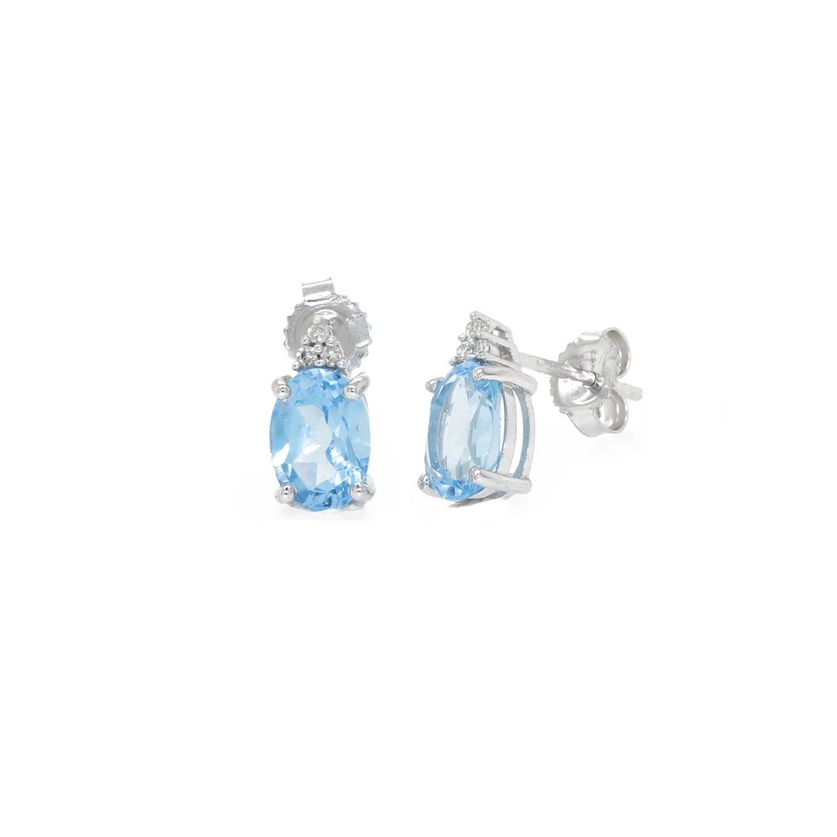 Aretes studs topacio azul 14k